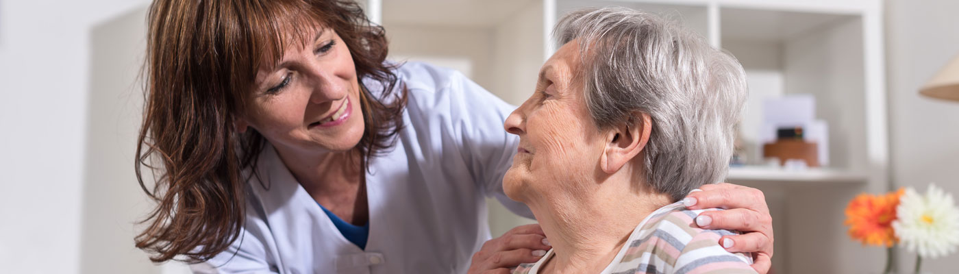 nurse and elderly woman