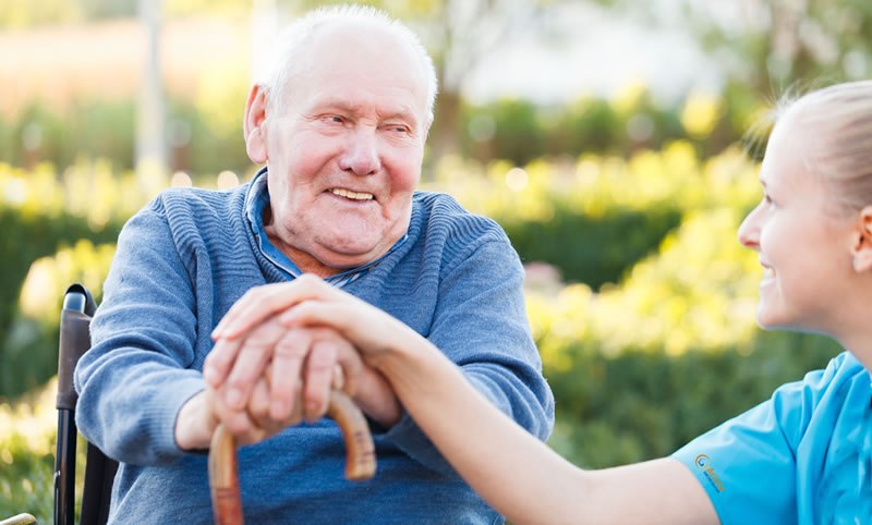 elderly man having a conversation